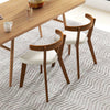 Wood dining chair set of 2 with padded seats and curved backs in walnut, perfect for dining rooms or restaurants.