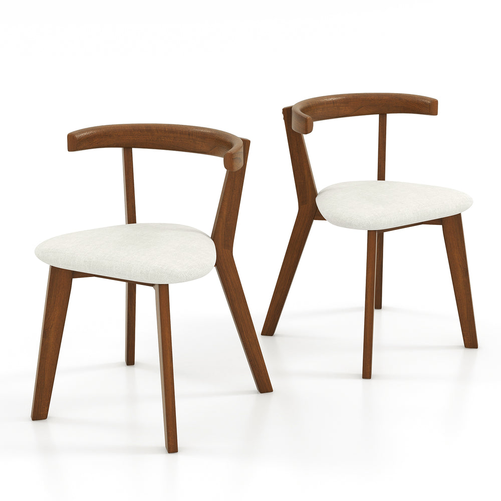 Set of 2 walnut wood dining chairs with padded seats and unique curved backrests for versatile home or restaurant use.