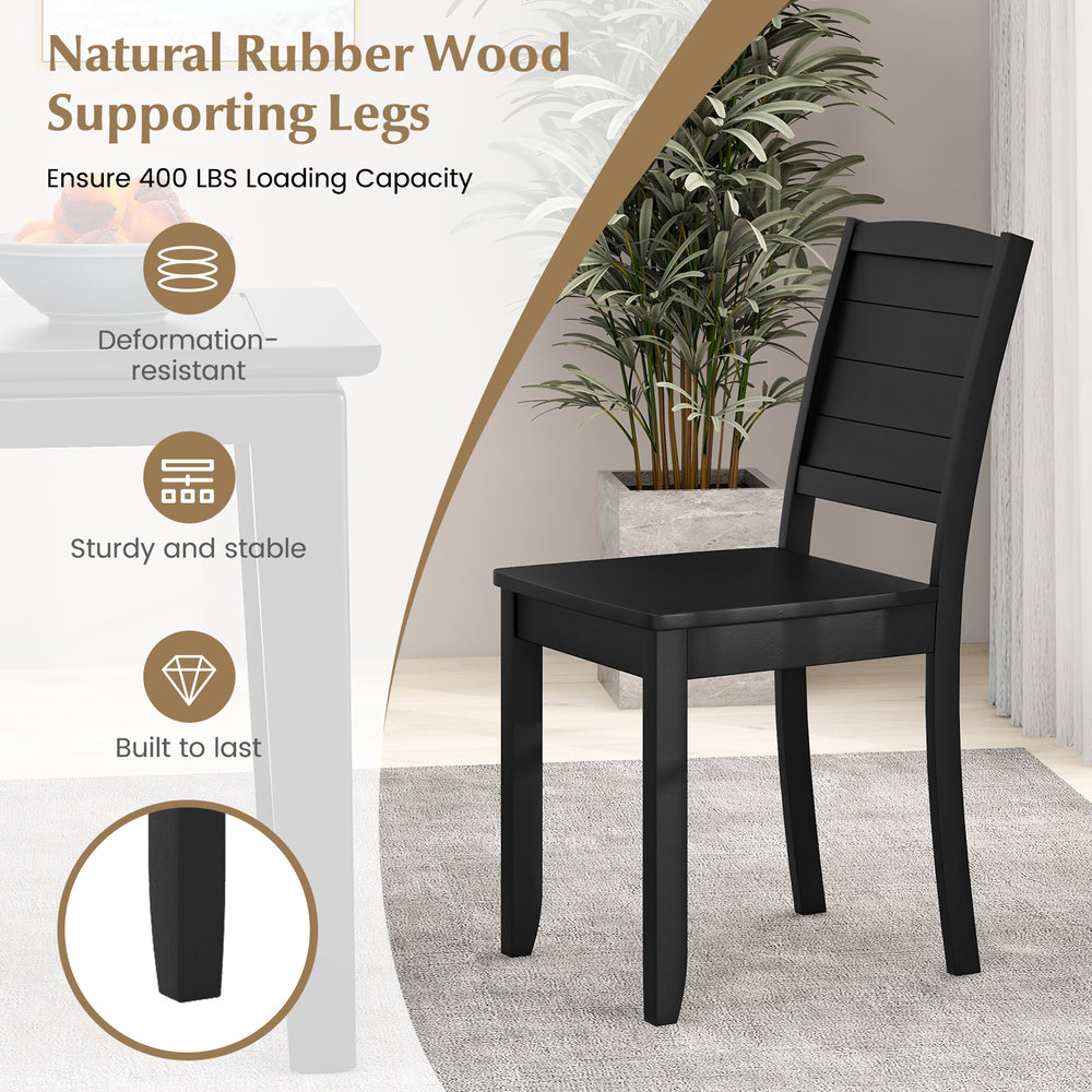 Black wood dining chair with rubber wood legs, sturdy design, and curved backrest for comfort in kitchen settings.