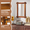 Wood framed mirror with acacia wood and vintage rivet design, enhancing rustic appeal in living spaces.