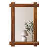 Wood framed mirror with acacia wood and vintage rivet design, perfect for enhancing rustic living spaces.