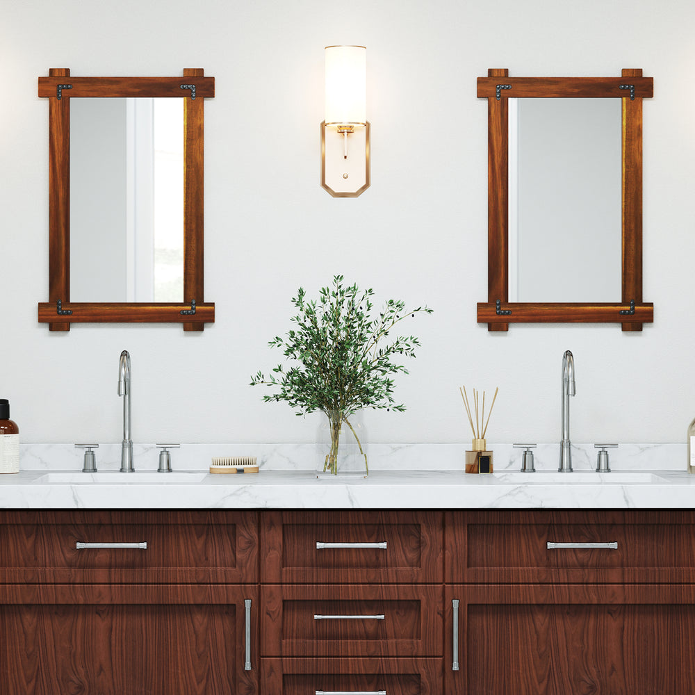 Wood framed mirror with acacia wood and vintage rivet design, enhancing rustic farmhouse appeal in a bathroom setting.