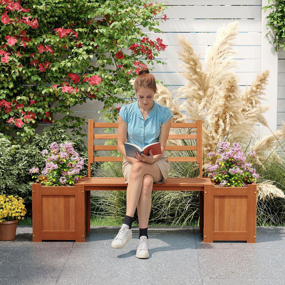 Wood planter box with bench and backrest, featuring a rustic design, perfect for garden or balcony relaxation.