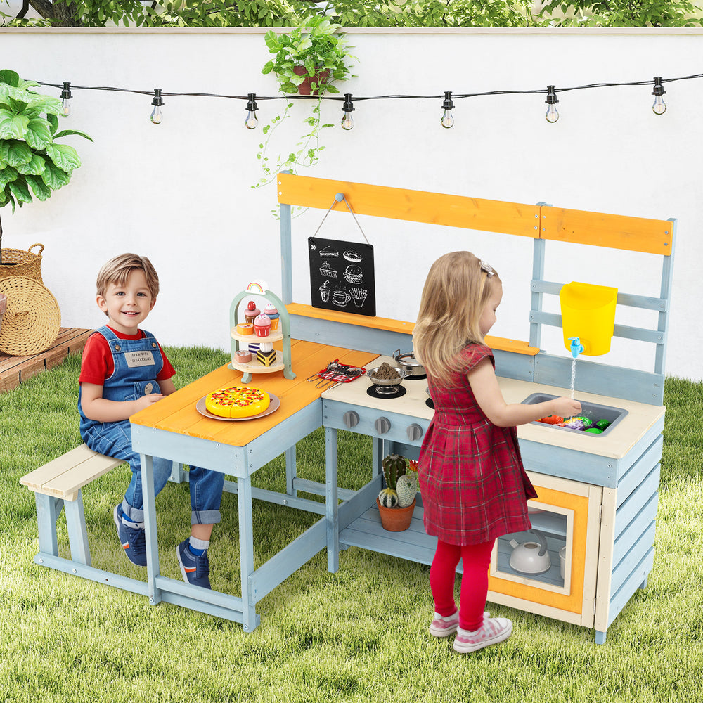 Children playing with the Fir Wood Play Kitchen and Picnic Table set, showcasing a fun outdoor cooking experience.
