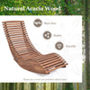 Outdoor acacia wood rocking chair with widened slatted seat and high back for backyard relaxation and stability.