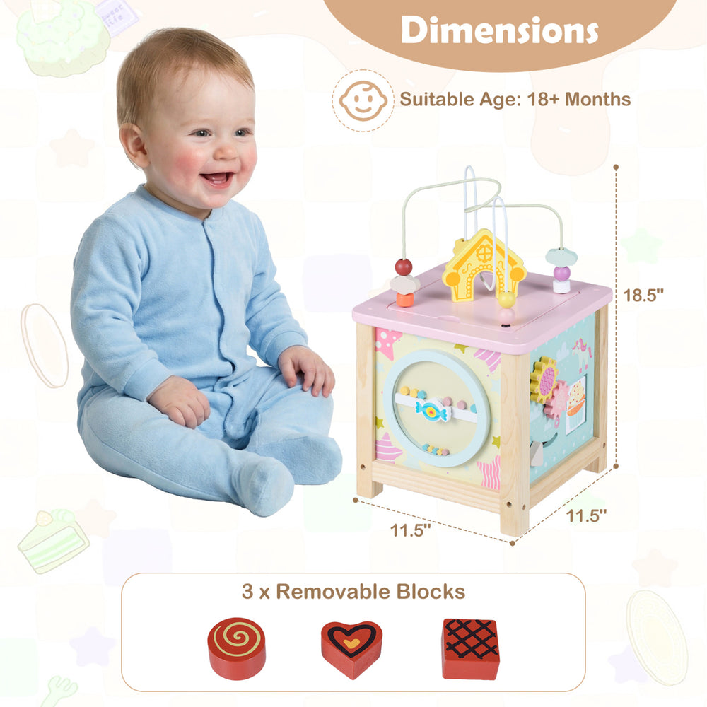 Wooden activity cube with removable blocks for toddlers, featuring a pretend kitchen and hidden storage for organized.