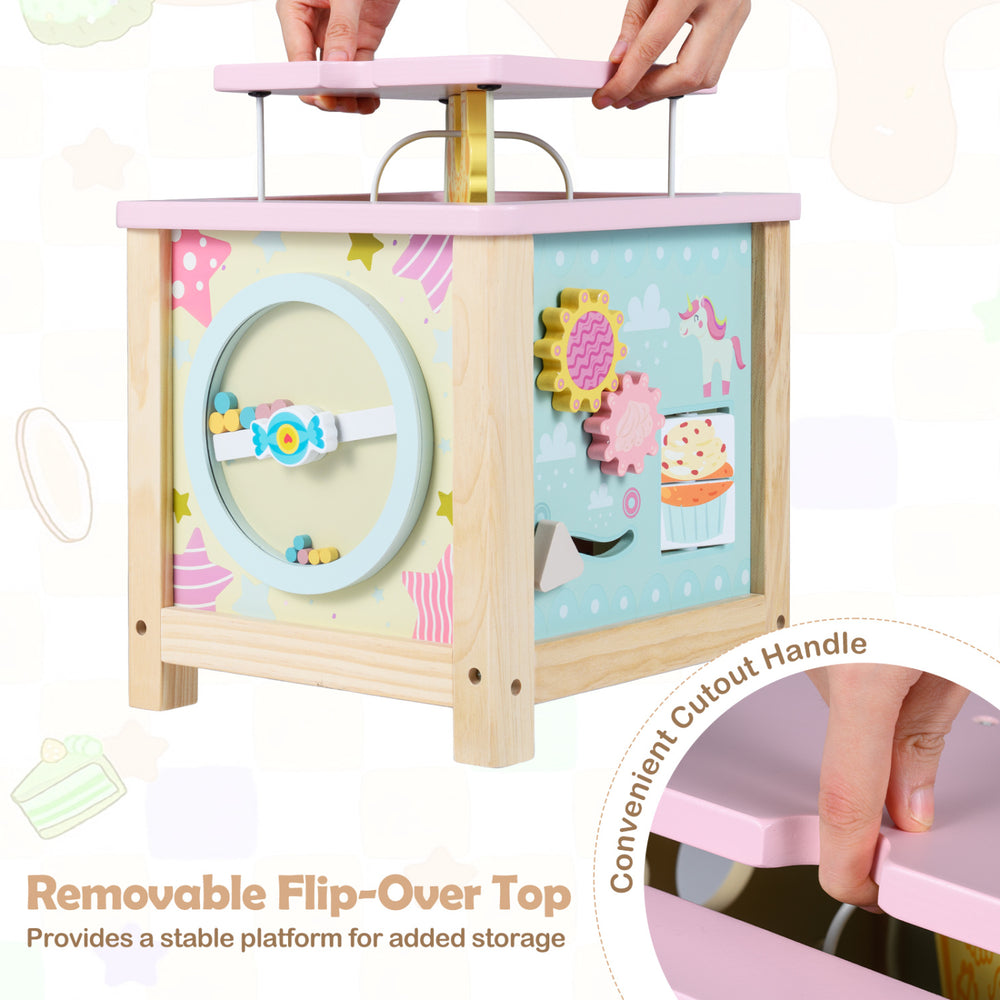 Wooden activity cube with removable flip-over top, featuring a dessert theme and convenient cutout handle for toddlers.
