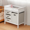 Wooden baby changing table with a solid pine frame, featuring three beige fabric drawers and a safety belt for diaper.