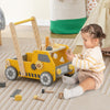 Yellow truck-shaped 2-in-1 wooden baby walker with adjustable speed and bottom storage, promoting creativity and.