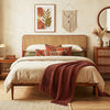 Boho rattan headboard wooden bed frame in brown with acacia wood, featuring slatted support and ample under-bed clearance.