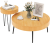 Round wooden coffee tables with metal legs, featuring a radial pattern, perfect for cups and decor in any living space.