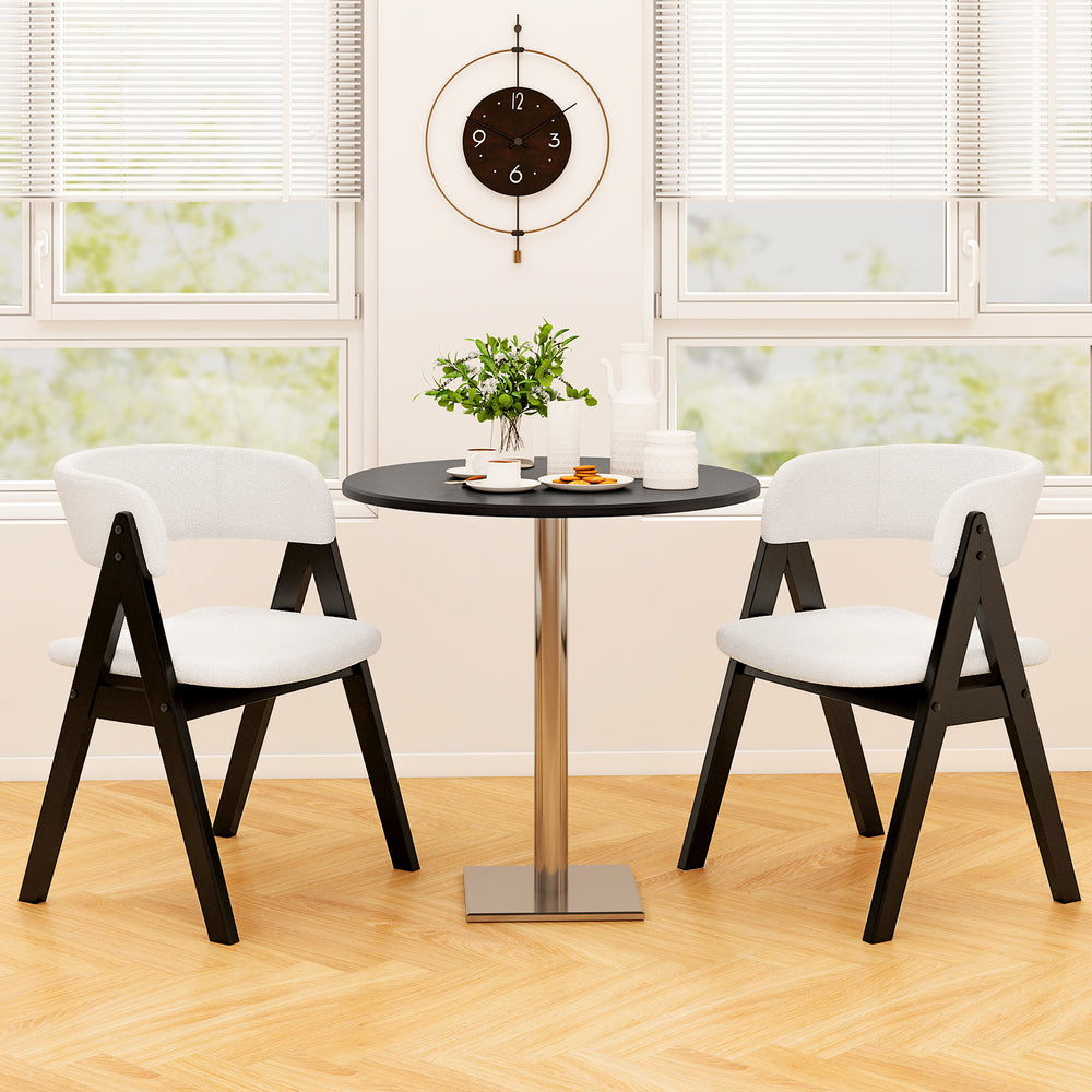 Mid-century modern dining chair set of 2 in black with white faux sherpa upholstery, perfect for kitchen or dining room.