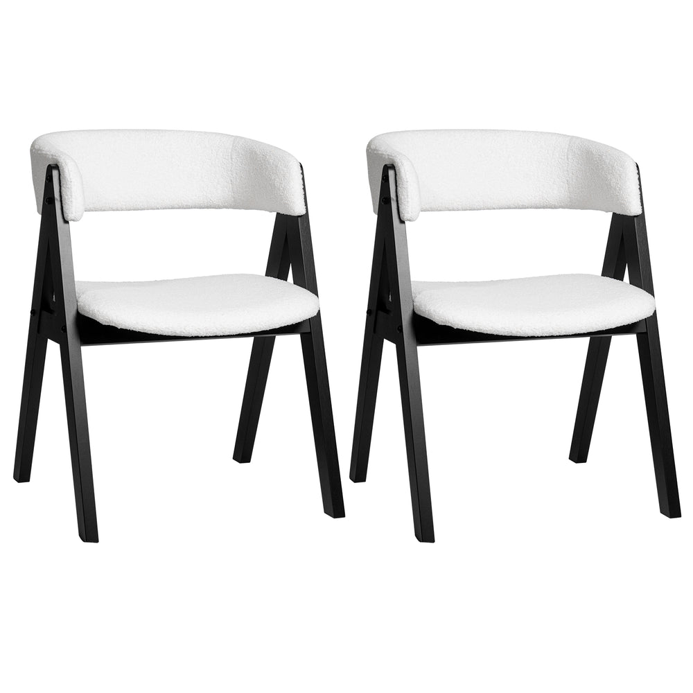 Set of 2 mid-century modern wooden dining chairs with black frames and white faux sherpa upholstery for stylish comfort.