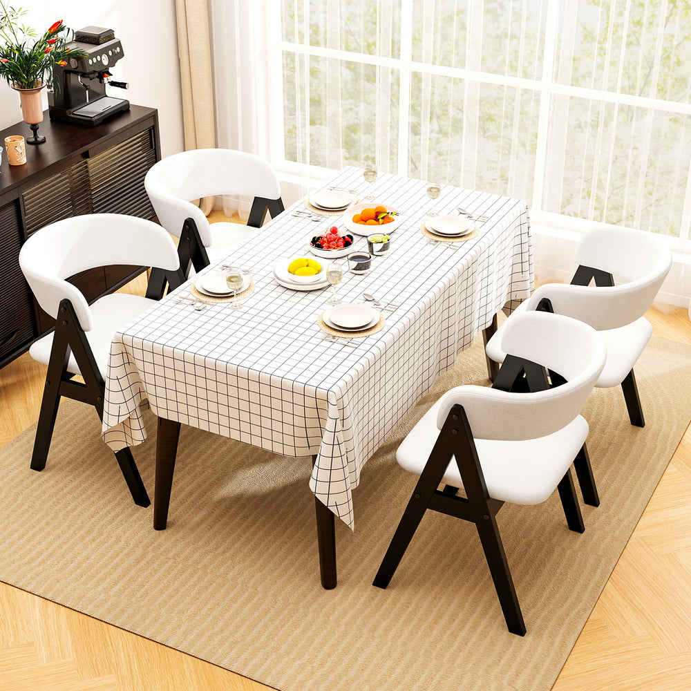 Mid-century modern wooden dining chair set of 2 in black with soft faux sherpa upholstery for stylish dining spaces.