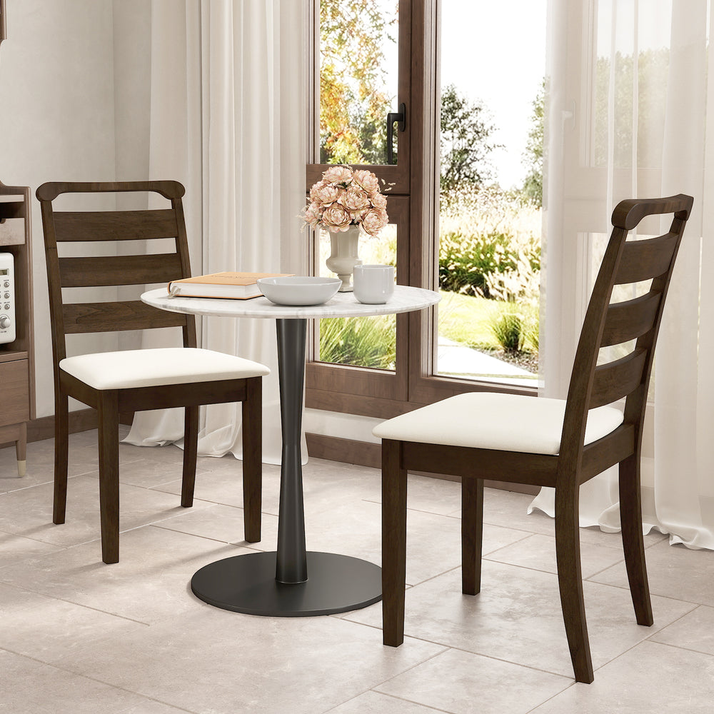 Walnut wooden dining chairs with white padded seats, featuring a retro design, perfect for dining rooms or cafes.