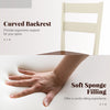 Curved backrest and soft sponge filling of a white PU leather dining chair, offering ergonomic support and comfort.