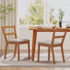 Set of 2 brown wooden dining chairs with upholstered seats, perfect for farmhouse kitchens and dining rooms.