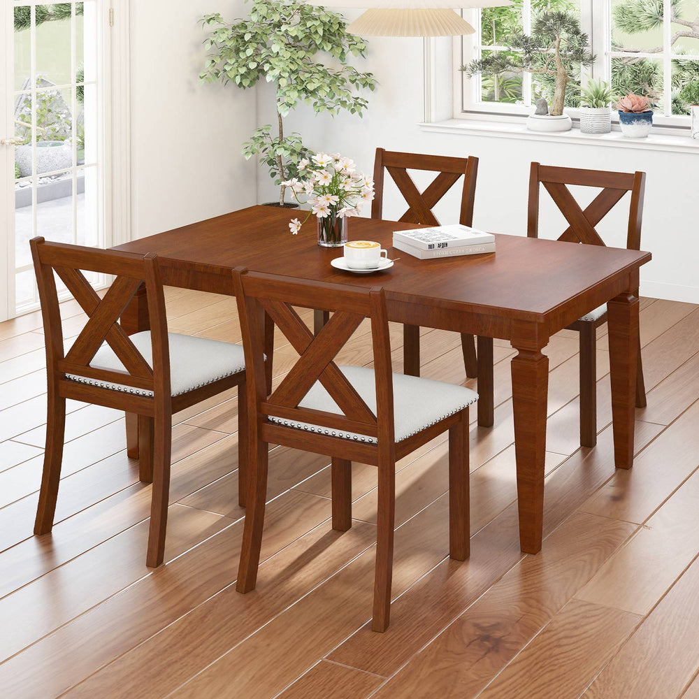 Wooden dining chair set with padded seats and curved backs in beige, crafted from acacia wood for durability and style.