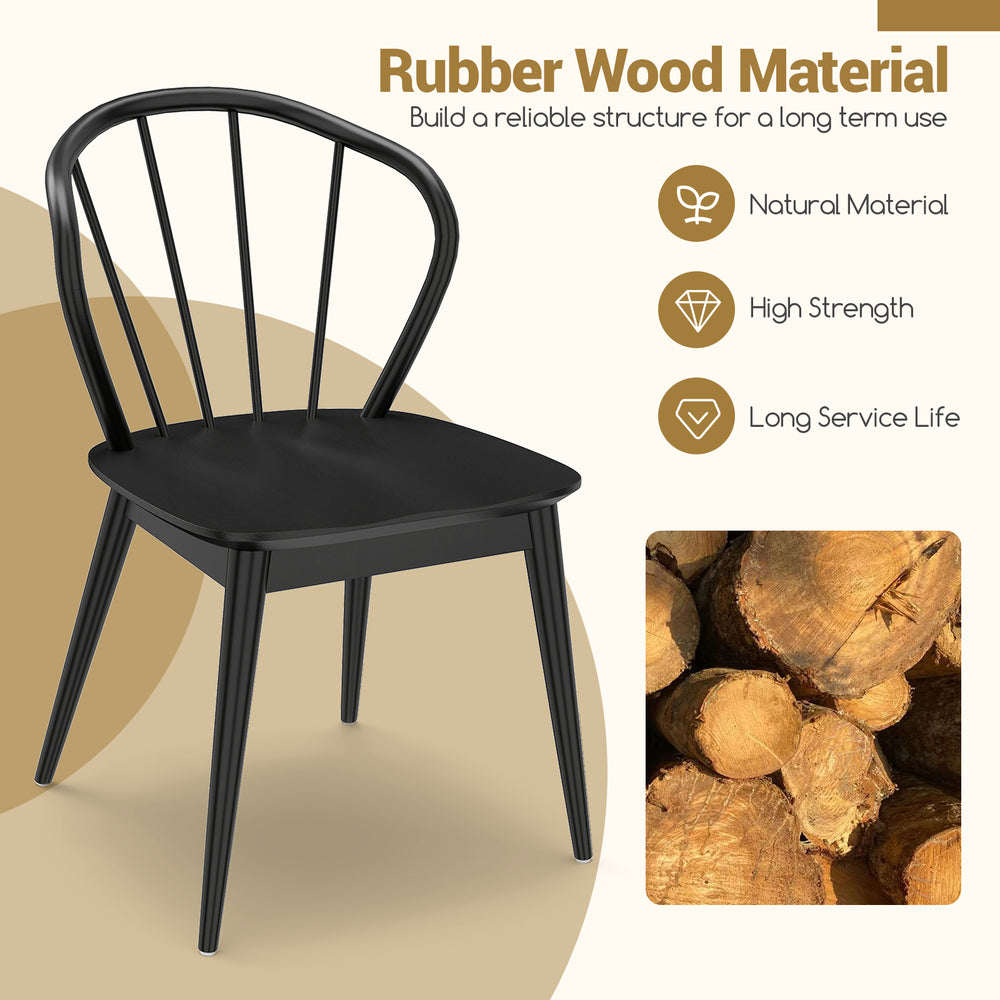 Black wooden dining chair with high spindle back, made of sturdy rubber wood for comfort and durability in any setting.