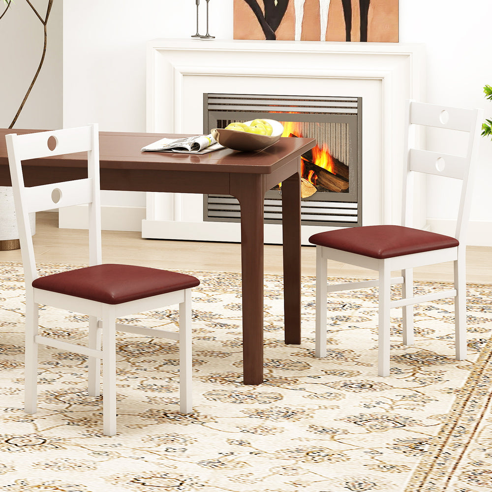White armless dining chairs set of 2 with upholstered seats and hollowed backrest, perfect for kitchens or dining rooms.