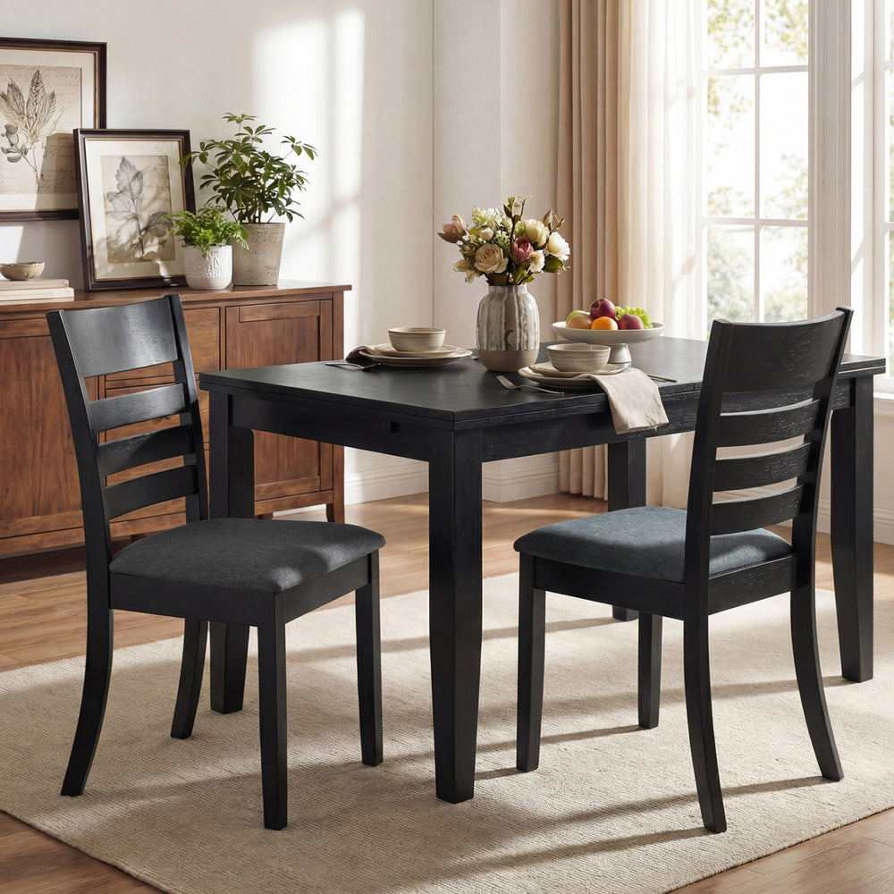 Black upholstered dining chairs with rubber wood frame, featuring high backrest and padded seat for comfort in kitchen.