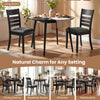 Set of 4 black upholstered dining chairs with rubber wood frame, ideal for kitchens and dining rooms.