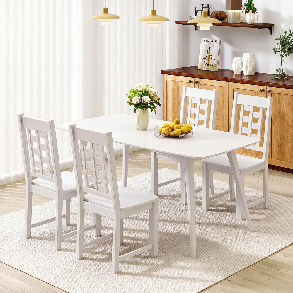 White wooden dining chairs set of 4 with solid rubber wood frame, featuring a curved backrest for comfort and support.