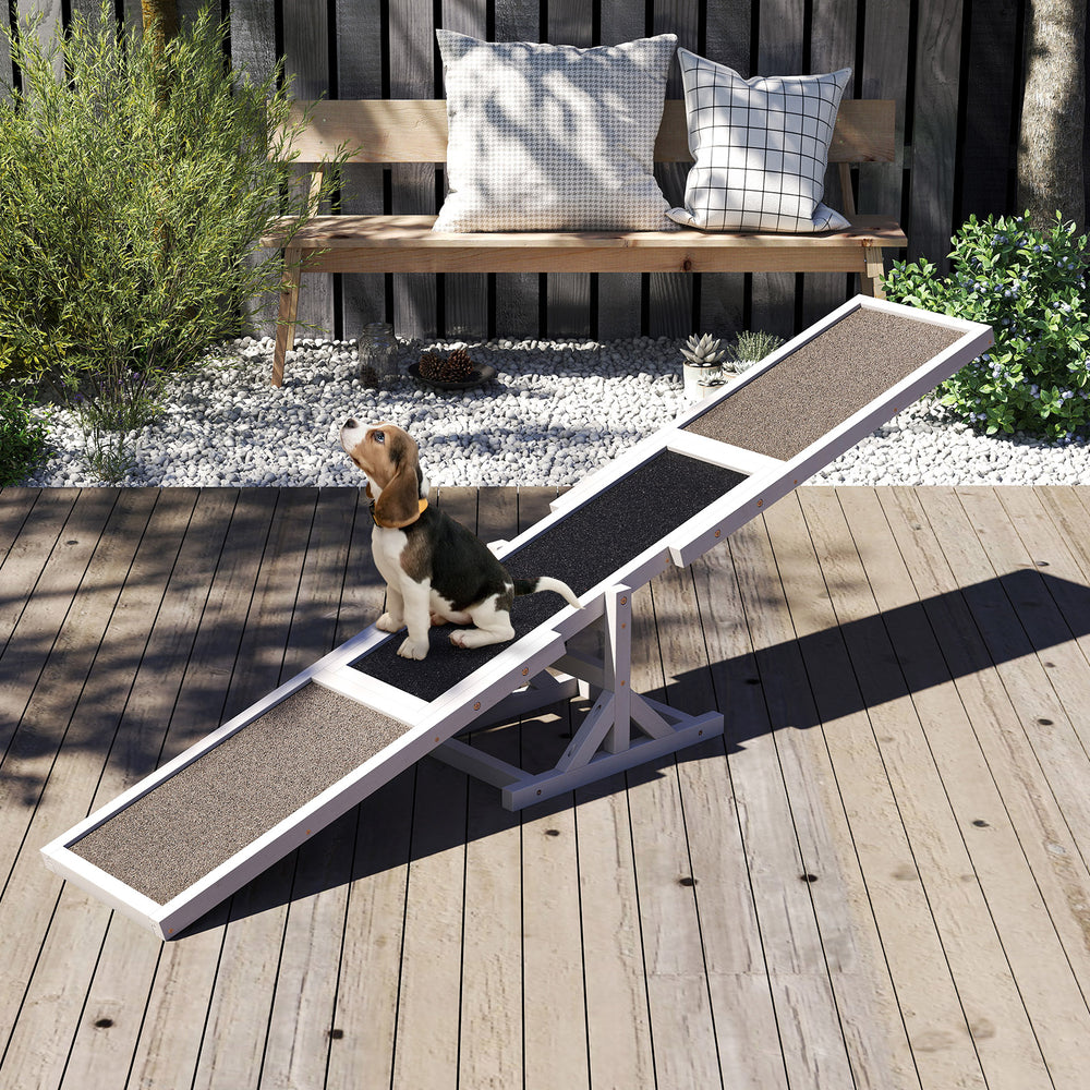 Wooden dog agility seesaw made of spruce wood with high-traction surface, ideal for outdoor obstacle courses.