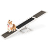 Wooden dog agility seesaw with high traction surface, designed for outdoor obstacle courses and training for dogs.