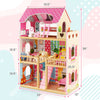 Three-story pink dollhouse playset with 6 rooms and 15 furniture pieces, promoting imaginative play for kids over 3.