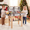 Wooden kids barbecue grill playset with grilling tools and play foods, perfect for imaginative cooking fun.