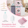 Wooden kids laundry playset in pink featuring a laundry detergent bottle and three clothes hangers for creative role.