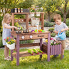 Wooden mud kitchen set in purple with working faucet, pots, and gardening tools for immersive outdoor play.