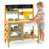 Wooden mud kitchen for toddlers features a sink with faucet, stoves, planter pots, and storage for outdoor play.