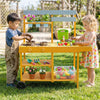 Wooden outdoor mud kitchen for kids in yellow, featuring flowerpots, wheels, and engaging cooking accessories for.
