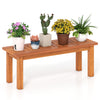 Wooden plant stand showcasing potted plants, crafted from solid wood with a brown finish, ideal for indoor and outdoor.