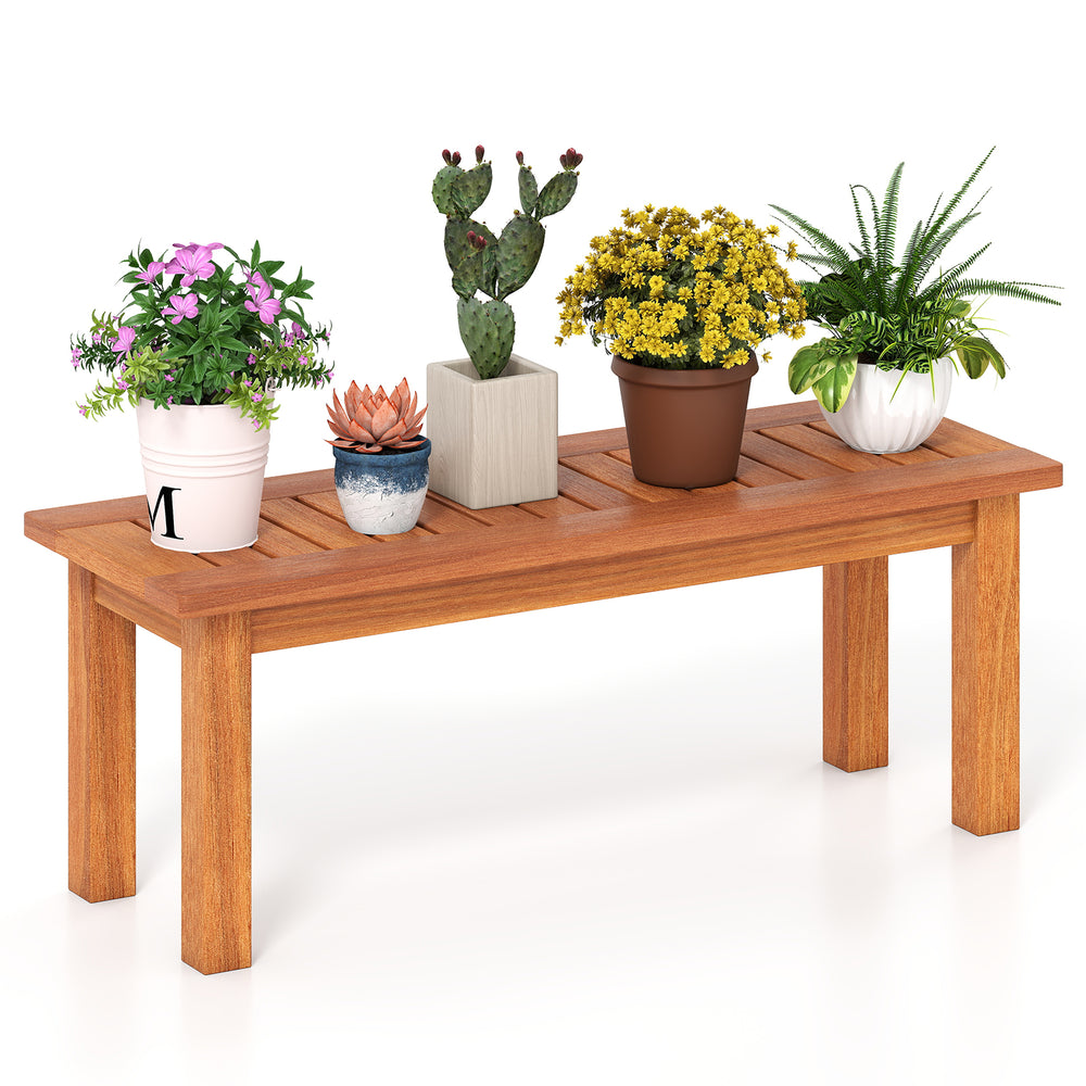Wooden plant stand showcasing potted plants, crafted from solid wood with a brown finish, ideal for indoor and outdoor.