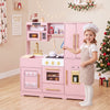 Wooden play kitchen set in pink and white features realistic lights and sounds, perfect for imaginative cooking fun.