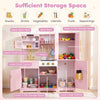 Wooden play kitchen for kids in pink and white with realistic lights, sounds, and ample storage for accessories.