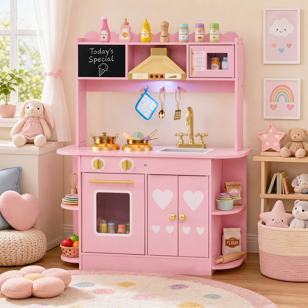 Wooden play kitchen for kids in pink with glowing stoves, storage cabinets, and realistic lights and sounds for imaginative play.