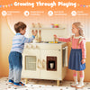 Wooden pretend kitchen playset in yellow with hanging hooks and towel rack, designed for kids’ imaginative culinary.