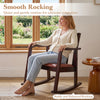 Wooden rocking chair with upholstered seat and ladder back, offering smooth rocking for ultimate relaxation in brown.