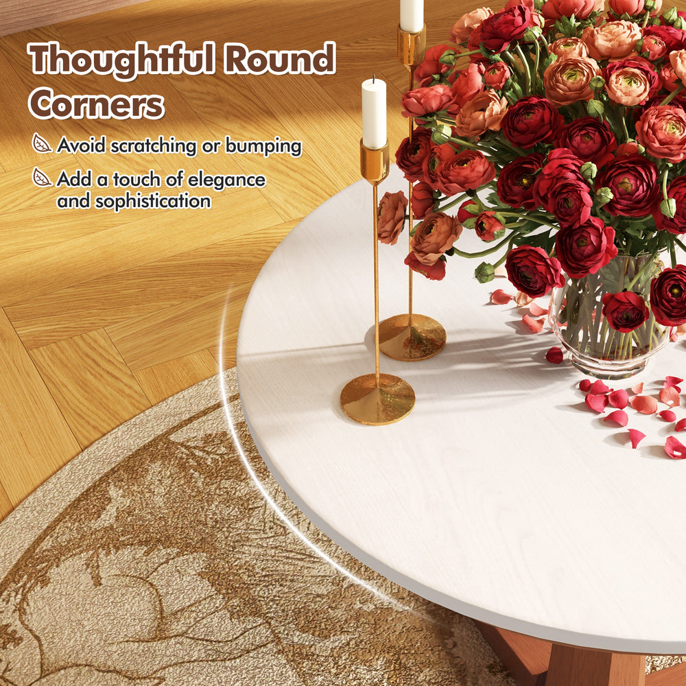 Round wooden dining table with pedestal base in cream white, featuring elegant round corners for safety and style.