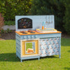 Wooden toy kitchen playset in blue with removable faucet, stovetops, and storage, perfect for imaginative play.