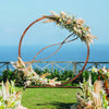 Wooden wedding arch backdrop with floral decor, crafted from natural fir wood, perfect for outdoor ceremonies.