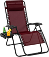 Dark red outdoor folding zero gravity reclining lounge chair with cup holder, perfect for beach or yard relaxation.