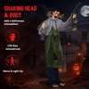 Life-size zombie Halloween decoration with glowing red eyes, shaking head, and simulated knife for a terrifying atmosphere.