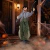 Life-size zombie Halloween decoration with glowing red eyes, bloody face, and simulated knife for outdoor haunted scenes.