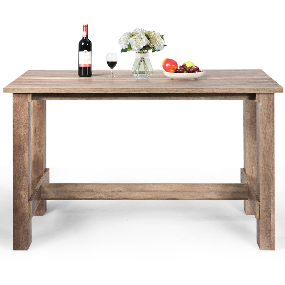 Counter height dining table with wood grain finish, ideal for dining rooms or kitchens, featuring a spacious desktop.