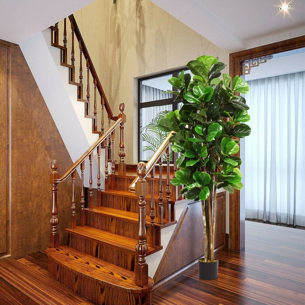 6-feet artificial fiddle leaf fig tree showcasing its thick trunks and abundant leaves, ideal for enhancing any.